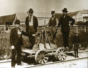 Typical railroad handcar, late 19th Century. Motion is activated by pumping handle pivoting on pedestal. photo from ebay