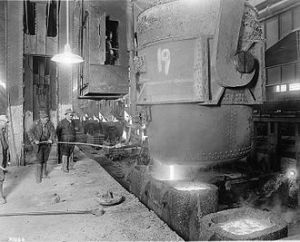 Molten steel from Bessemer converter filling mold at Homestead Steel Works from Wikipedia